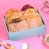 6 x New York Cookies, Cupcake Jemma's Favourites in a Crumbs & Doilies box with six assorted cookies on pink background